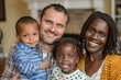 © Rayhanbp - Happy family portrait with diverse parents and children smiling indoors at home