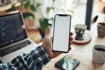 latin indian adult student holding using mock up of cell mobile smartphone with empty blank white sc