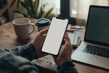 latin indian adult student holding using mock up of cell mobile smartphone with empty blank white sc