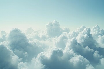 Wall Mural - A breathtaking aerial view of fluffy cumulus clouds filling the vast expanse of the sky.