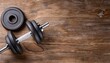 © Stefan Schurr - sport equipment; dumbbells on wooden background