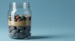 © LittleDuck - Capacity Management Prioritization Concept - A jar layered with water, sand, pebbles, and rocks symbolizes time management, workload, prioritization, capacity, and resource allocation