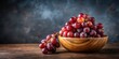 © Songkran - Fresh red grapes arranged artfully in a small wooden bowl with a minimalist background , natural, wood,  natural, wood, still life