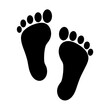 © Zubaraj - Symbolic black footprints on white background representing movement and identity