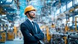 © Abdul - A man in a hard hat and suit stands in a factory with digital schematics overlaid on the background