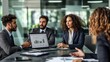 © Abdul - Diverse Business Team Meeting with Laptop in Office