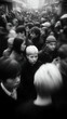 © Kootenay - Monochrome Urban Crowd: Blurred Motion and Anonymity in Modern City Life