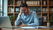 © jack - Desk Contemplation: Focus and Problem Solving