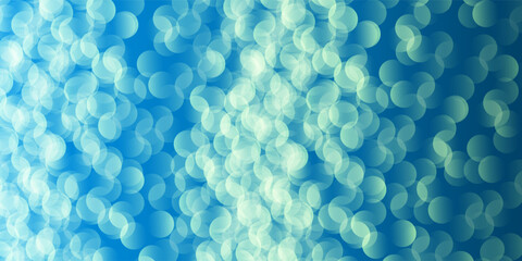 Wall Mural - a soft green and blue bokeh pattern background creates a dreamy, ethereal atmosphere. the blurred ci