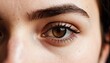© Aleks - Close-up of a person's expressive brown eye