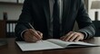 © Qo - Businessman signing contract, serious expression, close-up shot, dark suit, wooden desk, office setting, pen in hand, legal document,