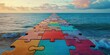 © Denis - An eye-catching image of a boardwalk leading into the ocean at sunset. The boardwalk features puzzle piece placements, creating an optical illusion of continuity against the beautiful backdrop of the