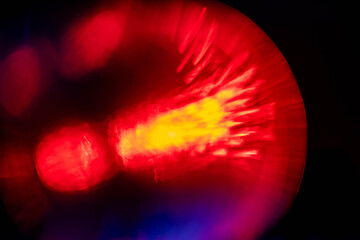 Wall Mural - red light leaks on dark background. abstract background for design with random shapes. colorful ligh