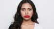 © Taufik - Young woman with facial cold sores isolated on white background symbolizing herpes simplex infection. Generative AI