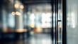 © Ganesha88 - Dynamic office interior with blurred background and door modern workspace urban setting perspective