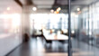 © Ganesha88 - Blurry office interior with subtle door view modern workspace professional environment soft focus