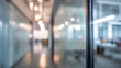 © Ganesha88 - Blurred office interior scene modern workspace corporate environment depth of field perspective