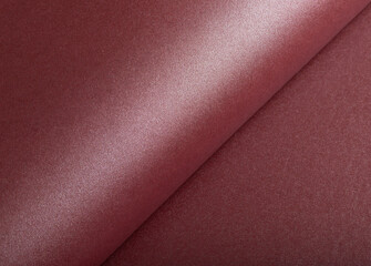Aufkleber - Paper texture with burgundy and wine red tones, glossy surface with shimmering sparkle, luxurious rolled designer paper in deep red, modern abstract design with rich contrast and smooth finish..