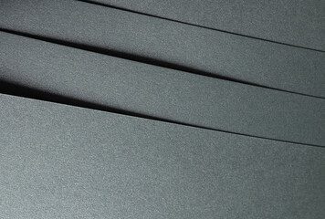 Aufkleber - Paper texture with glossy finish, chic layered designer paper in dark green, forest green, and olive green, shimmering surface with geometric lines and metallic green accents, elegant modern.
