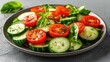 © arsyi_06 - Cucumber tomato salad with basil, on a plate