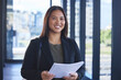 © peopleimages.com - Asian woman, paperwork and prepare for meeting in portrait, accountant and reading budget report. Female person, finance and professional for project management or documents, information and research