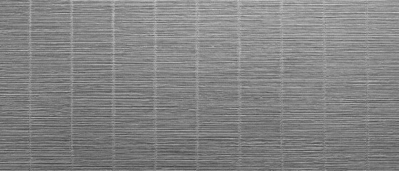 Aufkleber - A black and white texture background a striped pattern. The photo is of a wall with a pattern of stripes