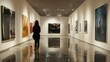 © Chinases - Art gallery. Person looks at colorful abstract paintings. Interior view in hallway. Modern art exposition. Hall with artwork displayed on white walls. Polished shiny floor.