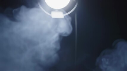 Wall Mural - Abstract white spot light with smoke