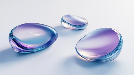 Smooth glass pebbles on light blue background, product display