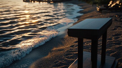 Canvas Print - Dark wood podium on beach at sunrise