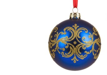 Wall Mural - Blue christmas ornament with gold glitter swirls hanging on a red ribbon