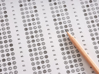 Wall Mural - A sheet of test exam paper filled with pencil.