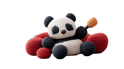 Aufkleber - Cute inflatable panda with knitted texture sits among red knitted cushions, holding small orange object. playful design and soft textures create cozy and whimsical atmosphere