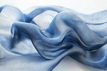 Fototapete - Draped blue fabric, sheer and textured, showcasing its soft, flowing nature.
