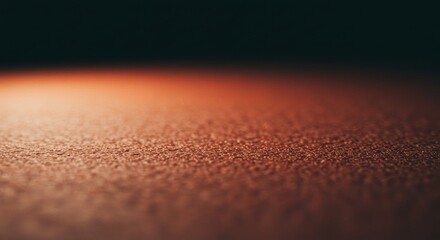Poster - A close up of a brown surface with a dark background