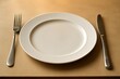 © FantasyLand86 - A close-up of a neatly arranged dinner setting, with a modern fork and knife placed symmetrically on each side of a pristine white plate.