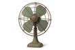 © InfinityArtCreator - Vintage Metal Fan with Decorative Grill and Pastel Blades