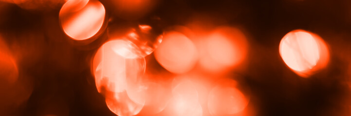 Wall Mural - Blurred lights, dark orange background, banner texture. Abstract bokeh with soft light header. Wide screen wallpaper. Panoramic web banner with copy space for design