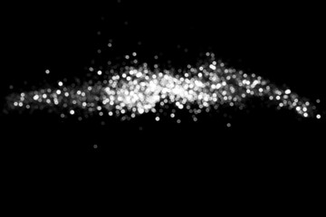 Wall Mural - white gray blurred bokeh lights on black background. glitter sparkle stars for celebrate. overlay fo