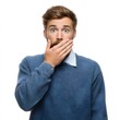 © Adel - Man with beard and blue sweater covering his mouth with his hand looking surprised on white background
