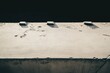 © pham - コンクリートの表面に残る影と小石の詳細な観察