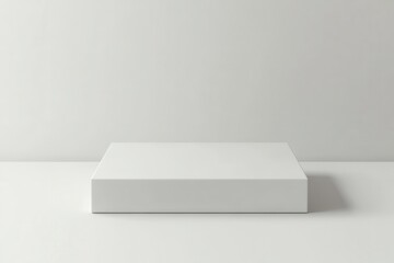 Aufkleber - Minimalist display platform: a clean, white stage for product showcases, offering simplicity and elegance to highlight displayed items.