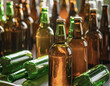 © lll - Sea of Empty Glass Bottles Representing Alcohol Problems