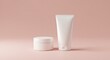 © Penggila - Minimalist Skincare Product Mockup: Elegant White Cream Jar and Tube on Blush Pink Background