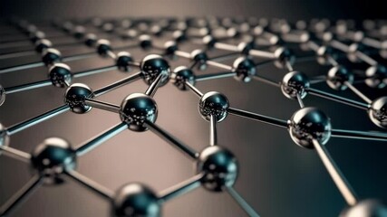 Abstract rendering of a molecular structure with shiny spheres and connecting rods in a repeating geometric pattern, resembling nanotechnology