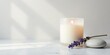 © Prakaikan - Serene Candlelight and Lavender Sprig on Smooth Stone Beside a Lit Candle in Soft Light