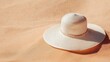 © Sarawut - White sun hat on warm beach sand, smooth surface texture, high-end vacation feel in ultra detail