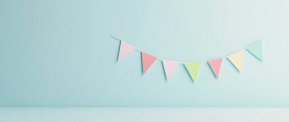 Poster - Pastel triangle bunting on light blue wall.