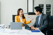 © Nuttapong punna - Portrait of success business people working together in modern office. Business teamwork startup
