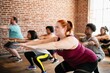 © Rawpixel.com - A diverse group of men and women doing squats in a fitness class. The fitness class includes people of different ethnicities, focusing on squats and exercise. Diverse group of people in fitness class